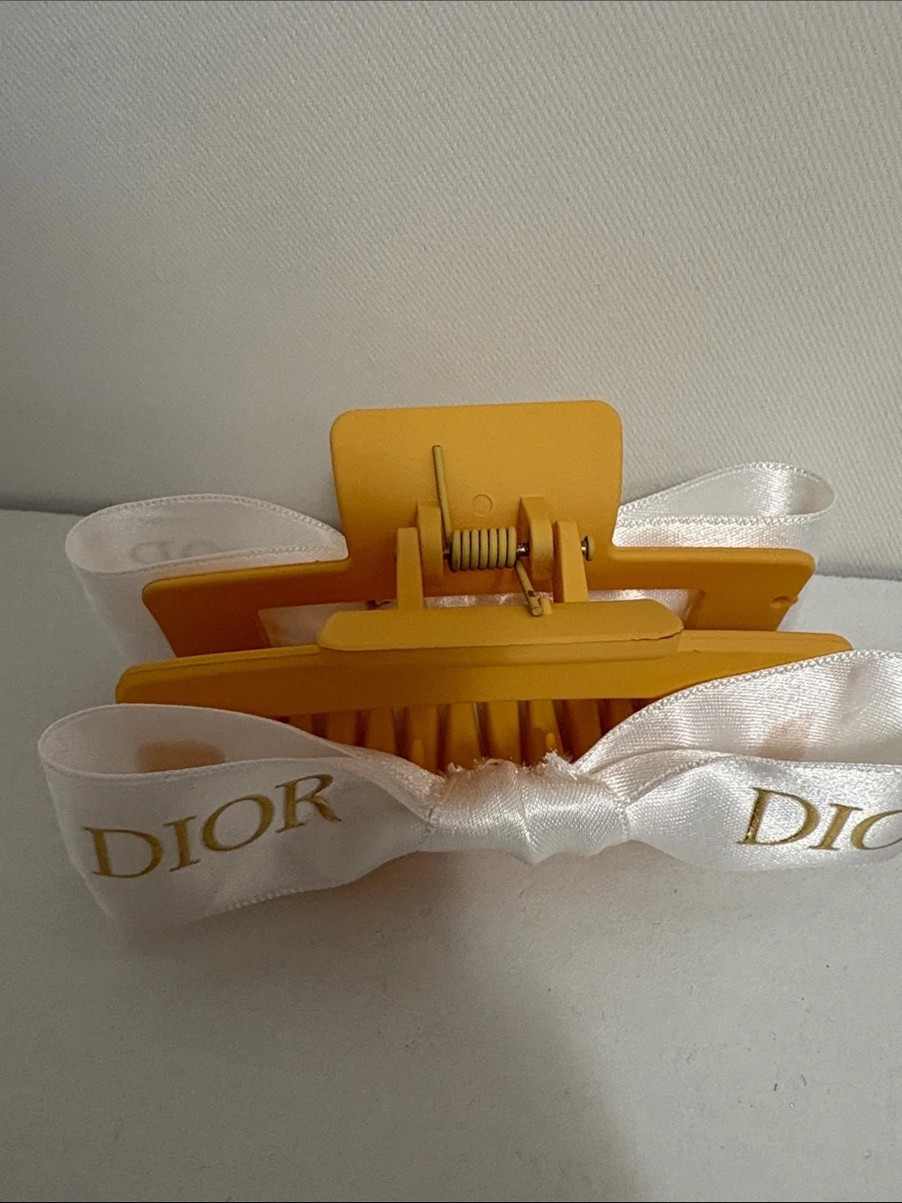 Dior Luxurious white and Gold Ribboned Hair Clip